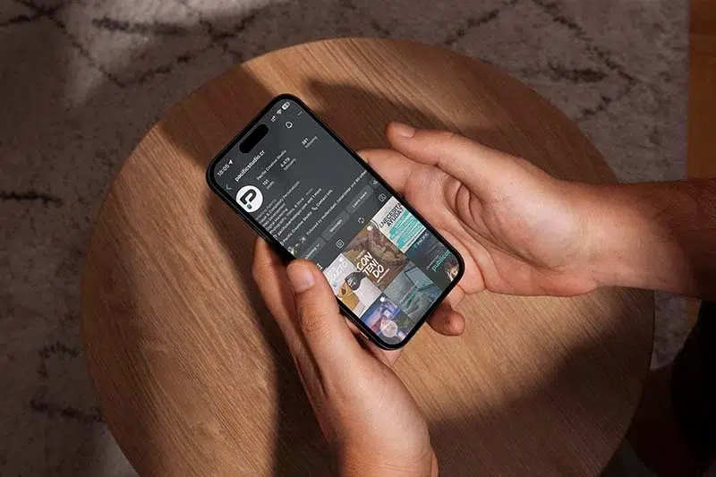 person viewing pacific studio on instagram website and social media profile shown on iphone