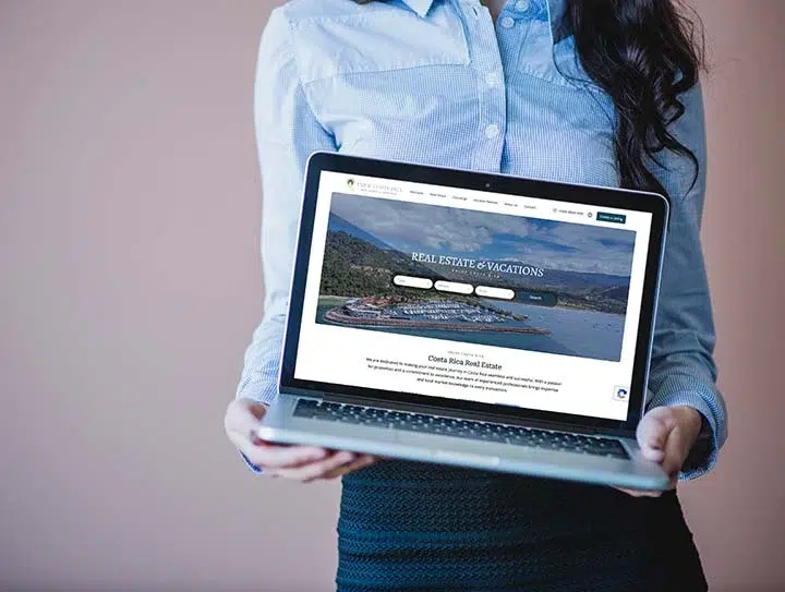 Lady holding computer with website by Pacific Lady holding computer with website by Pacific